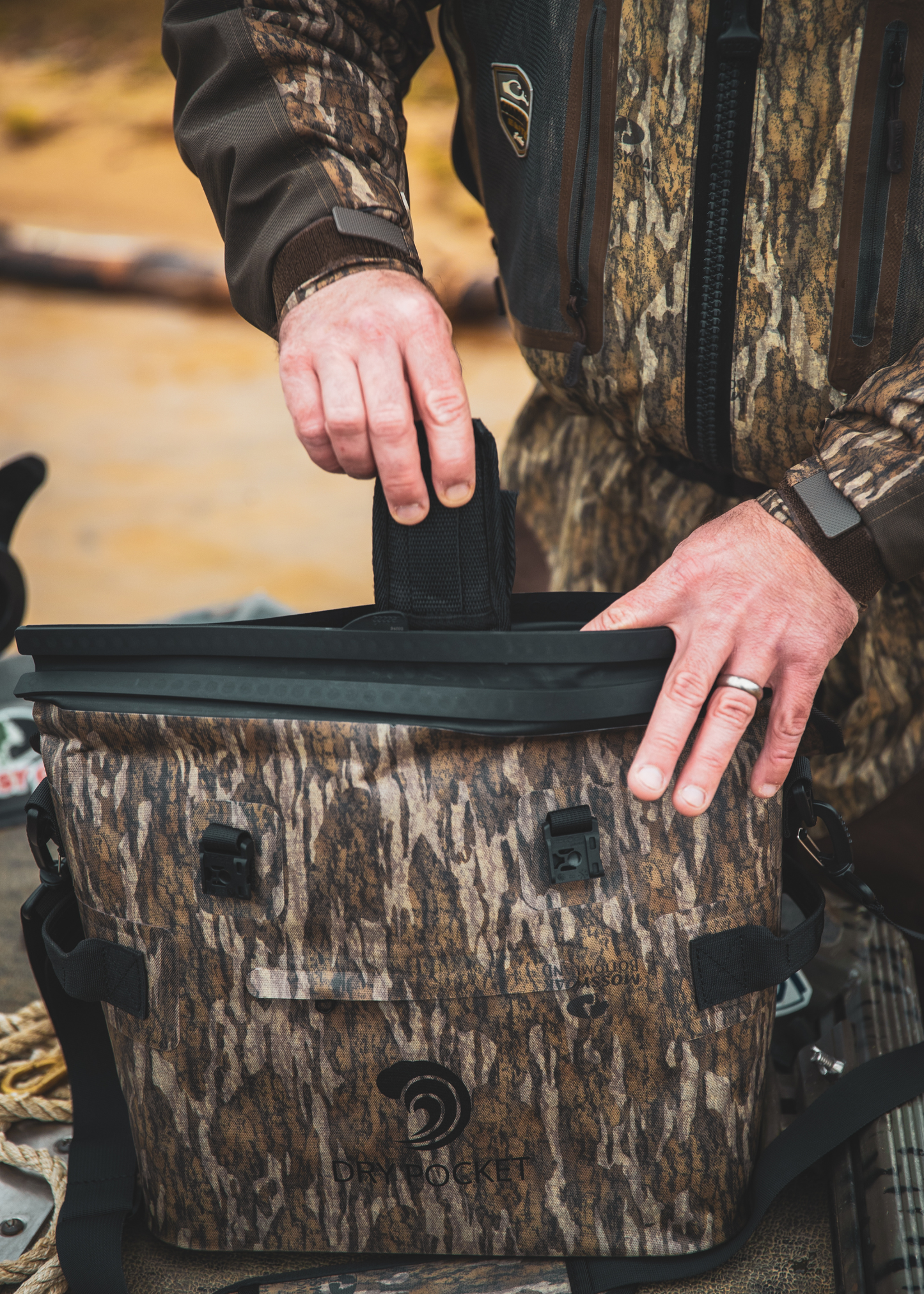 Mossy Oak - Auto-Sealing, Waterproof, Floating, Scent Proof Day-Pack Cooler